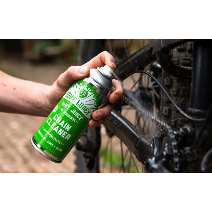 applying Dirt Juice 'In-a-Can' Chain Cleaner to chain