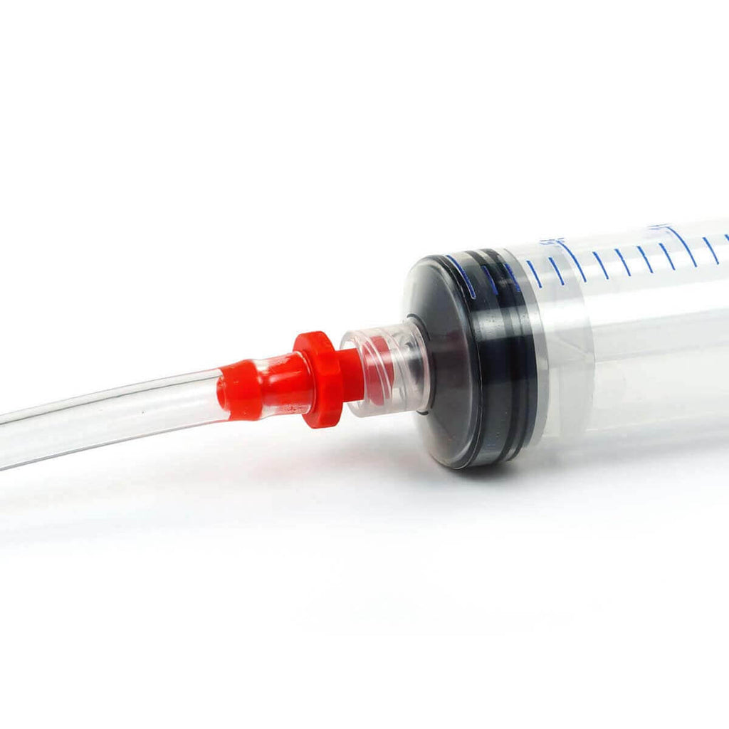 locking syringe with luer fitting and bleed tubing