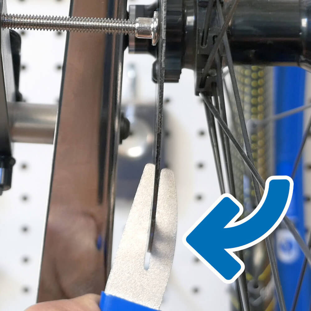 Park Tool Rotor Truing Fork (DT-2) during use rotor truing guide